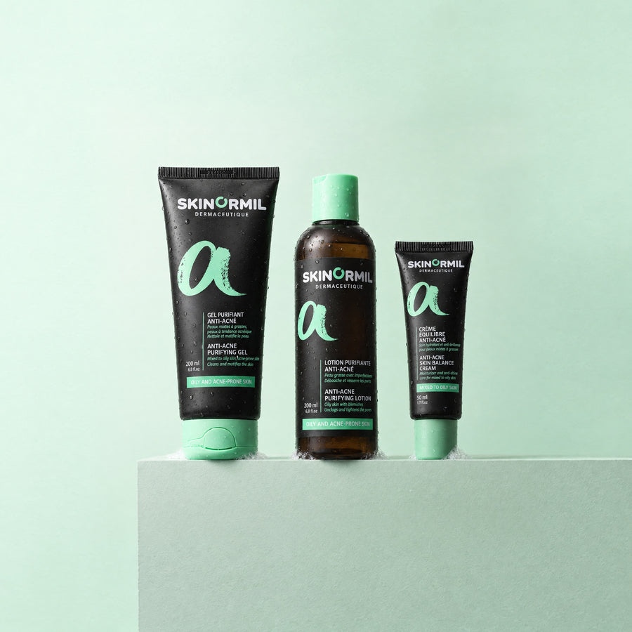 Skinormil Anti-Acne Essentials 3-step routine on a soft backdrop